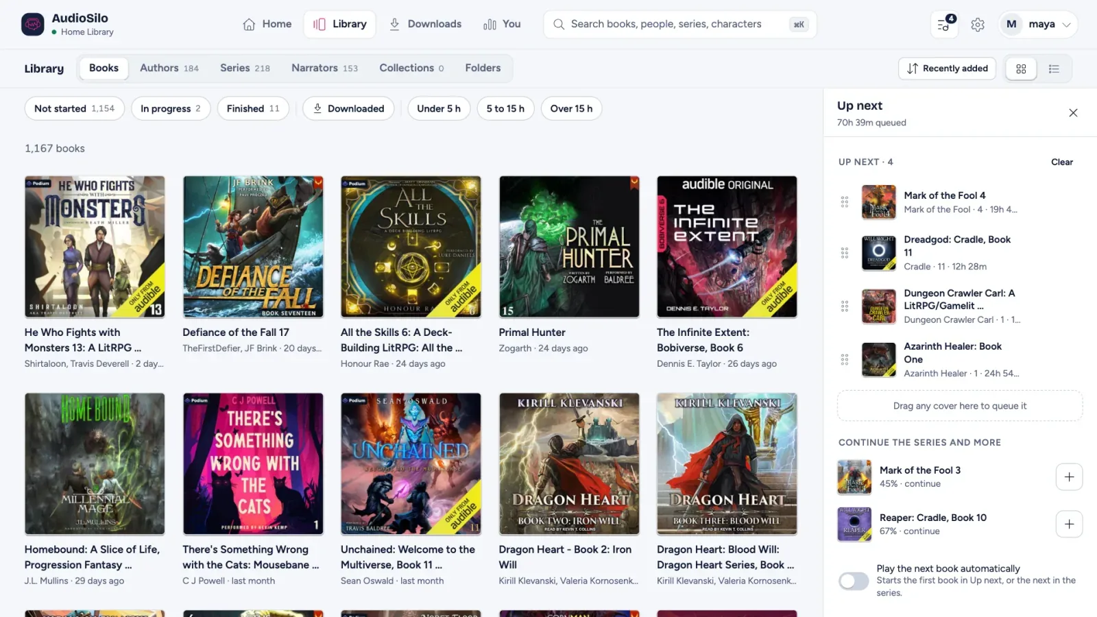 The web player in a desktop browser: the library grid with the Up next drawer open, four books queued and the series to continue